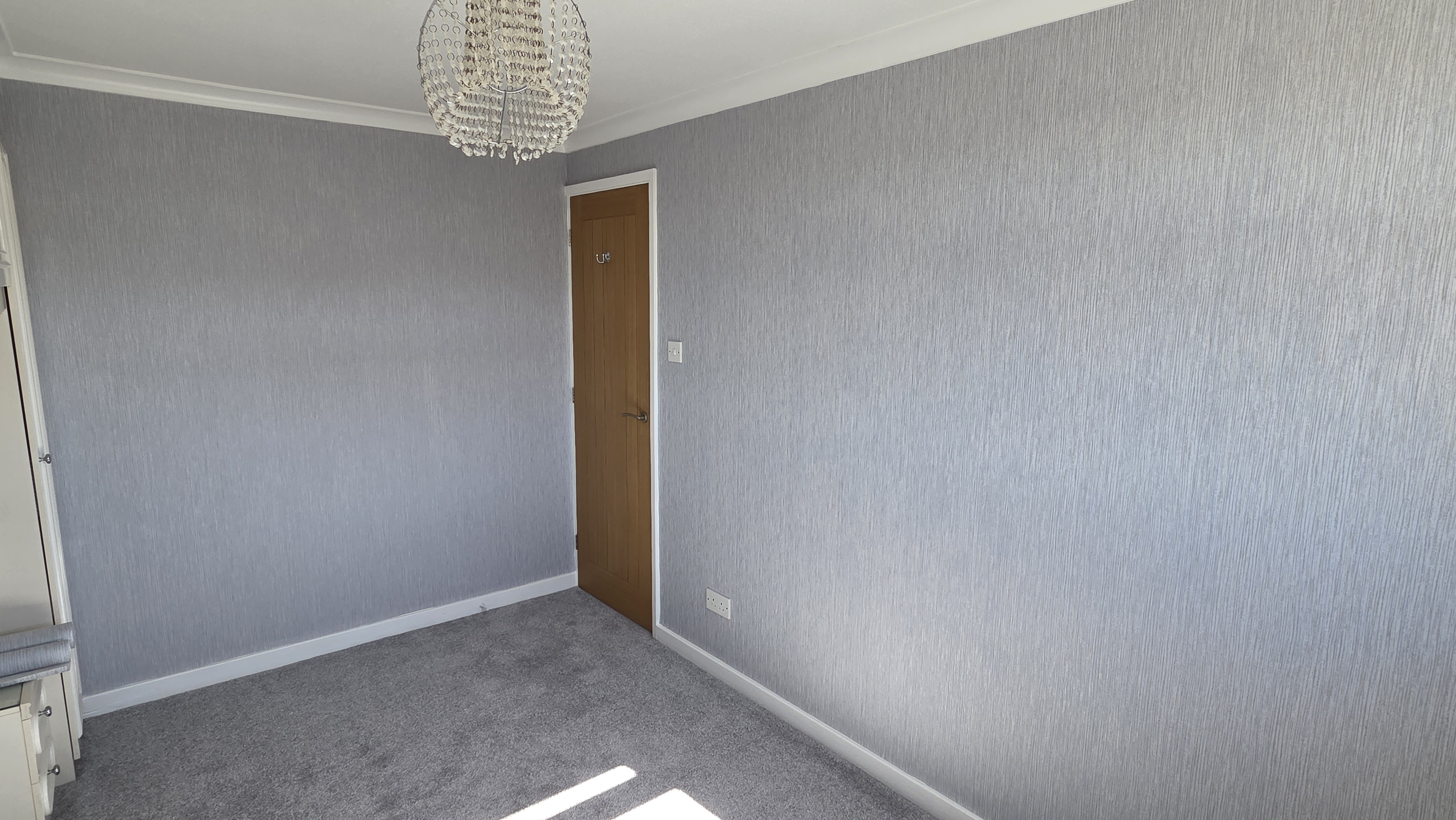 Bedroom wallpapering, Bridlington